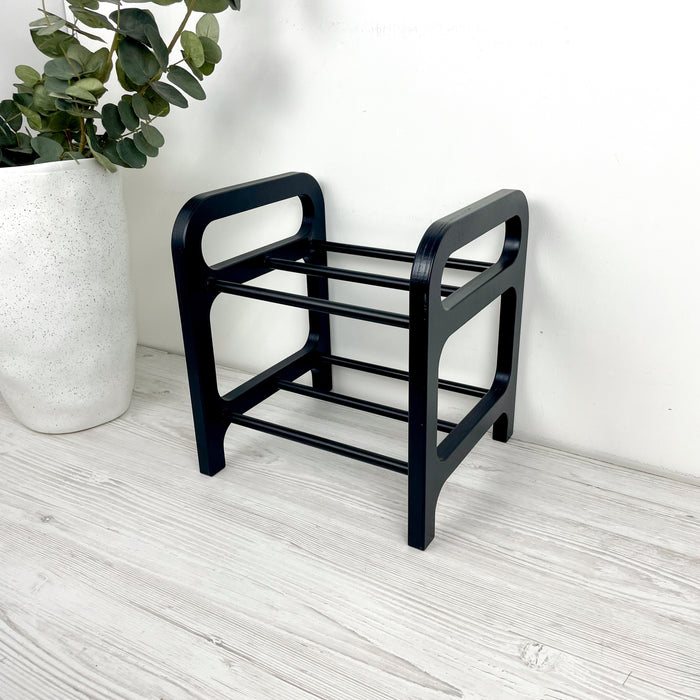 Чорна обувничка для взуття в передпокій