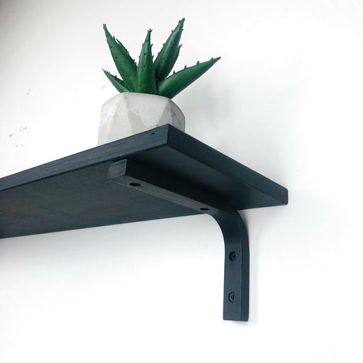 Black Floating Shelf With Wood Brackets - Image 1